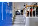 Open foyer with a staircase leading to the living area and hardwood flooring at 169 Knights Ct, Dallas, GA 30157