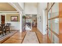 Inviting foyer with hardwood floors and elegant staircase that enhances the home's aesthetic at 4850 Boulder Stone Way, Auburn, GA 30011