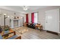 Cozy living room featuring modern light fixtures, and neutral decor at 999 Chestnut Oak Ct, Lawrenceville, GA 30046