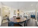 Bright open floorplan joining kitchen to dining and living spaces at 1292 Park Bench Pl, Mableton, GA 30126