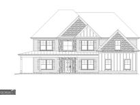 Charming home featuring multi-pane windows, stone accents, and a symmetrical facade, embodying a welcoming, classic design at 5484 Two Hills Dr # 32, Fairburn, GA 30213