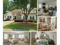 Charming two-story house with landscaped yard and mature trees at 1461 Hada Ln, Lawrenceville, GA 30043