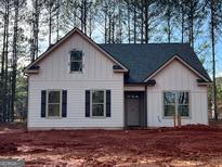 Charming new construction home with a modern farmhouse design and inviting curb appeal at 1547 South Bethany Rd, Mcdonough, GA 30252