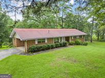 Brick ranch house with large yard at 200 Old Stagecoach Dr, Stockbridge, GA 30281