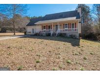 Ranch style home with front porch and large yard at 165 Nandover Way, Fayetteville, GA 30215