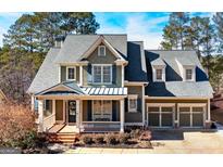 Charming two-story home with a welcoming front porch and a two-car garage at 37 Highcrest Dr, Acworth, GA 30101