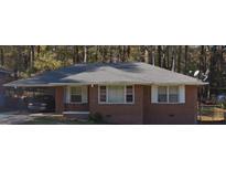 Brick ranch house with carport and mature trees at 2461 Baywood Se Dr, Atlanta, GA 30315