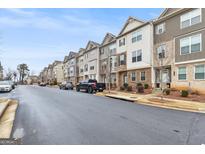 Row of modern townhouses with parking at 1716 Prelude Pointe, Marietta, GA 30067