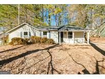 Updated Ranch home with a covered porch and large yard at 8479 Alden Dr, Riverdale, GA 30274