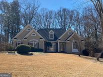 Beautiful two-story home with a landscaped yard at 45 Gardenia Ct, Oxford, GA 30054