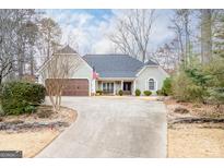 Charming single Gathering home with a well-maintained lawn and two-car garage at 3030 Shallowford Park Mnr, Roswell, GA 30075