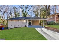 Charming single-story home with a covered carport and freshly painted exterior at 2740 Bonnybrooke, Atlanta, GA 30311