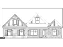 An elevation rendering of a brick home featuring dormer windows and shuttered windows at 2117 Ella Springs Dr, Covington, GA 30014