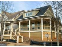 Charming home with inviting front porch and a stylish exterior design at 5106 N Pratt St, Covington, GA 30014