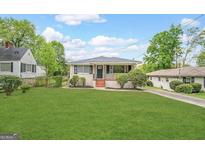 Charming single-story home with a well-maintained lawn and inviting curb appeal at 128 Sewanee Nw Ave, Atlanta, GA 30314