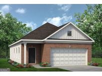 Charming single-story home featuring a brick facade, a two-car garage, and a well-manicured lawn at 10458 Trellis Lane (Lot 40), Hampton, GA 30228