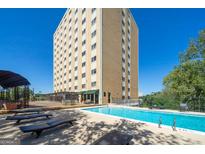 Beautiful outdoor pool area with lounge chairs, perfect for relaxation and enjoying sunny days at 2285 Peachtree Rd # 602, Atlanta, GA 30309