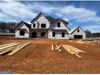 Two-story home under construction with a charming design, showcasing its potential at 454 Snead Road # 3, Fayetteville, GA 30215