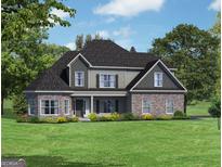 Charming two-story home featuring stone accents, gray siding, and a well-manicured lawn at 6025 Old Timber Trl # 11, Douglasville, GA 30135
