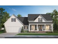 Charming two-story home featuring white siding, a covered porch, and an attached garage at 6159 Se Pinewood Dr, Covington, GA 30014