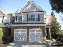 Charming home with two-car garage and traditional design elements at 11 Reese Way, Avondale Estates, GA 30002