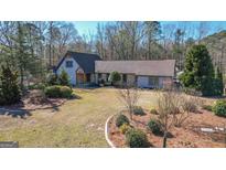 Charming single-Gathering home with meticulously landscaped front yard and craftsman accents at 101 Appleseed Ct, Peachtree City, GA 30269
