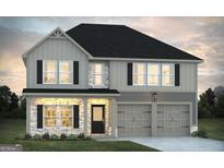 Two-story home with gray siding, black shutters, and a two-car garage at 342 Overlook Rd, Walnut Grove, GA 30052