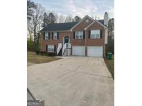 Charming two-story brick home with a two-car garage and inviting front porch at 3731 Patti Pkwy, Decatur, GA 30034