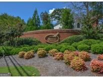 Landscaped entrance sign to the Highland Pointe community on a sunny day at 3626 Lone Indian Trl, Marietta, GA 30066