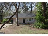 Charming single-story home with a well-manicured front yard, offering a welcoming curb appeal at 2823 Horse Shoe Dr, Atlanta, GA 30316