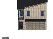 Charming two-story home featuring light brick, stone accents, and a convenient two-car garage at 4829 Station Ln # 30, Union City, GA 30349