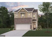 Charming two-story home with a brick facade and a two-car garage nestled on a lush green lawn at 1020 Sutherland Lane # 41, Lawrenceville, GA 30043
