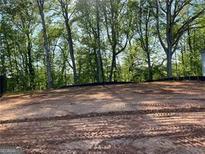 Cleared lot for new construction with a wood line at 4678 Glore Sw Rd, Mableton, GA 30126