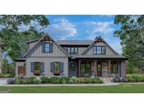 Charming gray two-story home with stone accents, covered porch, and professionally landscaped yard at 0 Pinegate Way, Sharpsburg, GA 30277