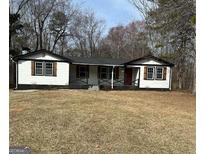 Charming single-story home with a well-maintained front yard and cozy curb appeal at 5949 Tyree Rd, Winston, GA 30187