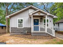 Charming single-story home with a welcoming front porch and attractive curb appeal at 3378 La Vista, Hapeville, GA 30354