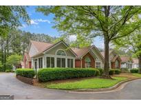 Charming single story home featuring well-maintained landscaping and an inviting facade at 3746 Vineyards Lake Nw Cir # U6, Kennesaw, GA 30144