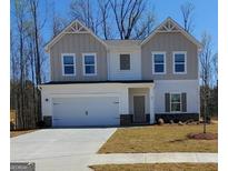 Charming two-story home featuring a spacious two-car garage and neutral color scheme at 99 Cooperton, Villa Rica, GA 30180