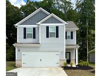Charming two-story home featuring a gray siding, black shutters, and a spacious white garage door at 431 Prescott Way, Villa Rica, GA 30180