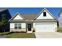 Charming home exterior with white siding, two-car garage, manicured lawn, and black front door with prominent house number at 442 Prescott Way, Villa Rica, GA 30180