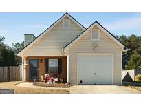 Charming single-Gathering home with a one-car garage and welcoming front porch at 351 Autumn Lake Dr, Mcdonough, GA 30253