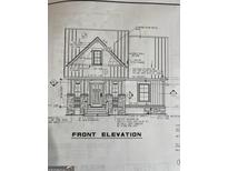 Blueprint of home showcasing a covered porch with stone columns and a standing seam metal roof at 509 Tree Rdg, Carrollton, GA 30116