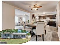 Open-concept design with dining and kitchen area featuring modern appliances and stylish decor at 203 Brannan Rd, Mcdonough, GA 30253