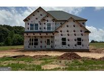 New two-story home with newly installed windows and wrapped in Tech-Wrap at 252 Old Jackson Rd, Mcdonough, GA 30252