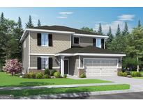 Charming two-story home with a well-manicured lawn, attached two-car garage, and a welcoming entrance at 3 Roving Hills Cir, Cartersville, GA 30121