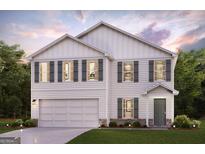Charming two-story home with white siding, gray shutters and a two-car garage, set against a colorful evening sky at 4678 Sunrise Rdg, Covington, GA 30016