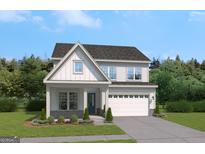 Charming two-story home featuring a two-car garage, landscaped yard and Craftsman-style architecture at 602 Belshire Dr, Acworth, GA 30102