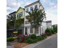 Attractive multi-level home with landscaped yard and inviting curb appeal, creating a welcoming first impression at 756 Cady Way, Atlanta, GA 30312