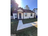 Charming single-story home with a well-maintained lawn and inviting front porch at 1132 Se Oak Knoll Ter, Atlanta, GA 30315