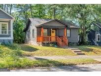 Charming craftsman-style home featuring a welcoming porch and a freshly painted exterior at 1336 Mcclelland Ave, Atlanta, GA 30344